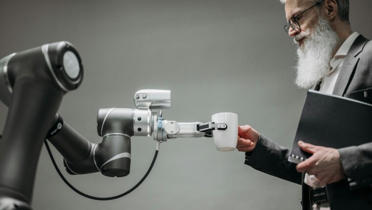 Photo by Pavel Danilyuk from Pexels: https://www.pexels.com/photo/a-robot-holding-a-cup-8439093/
